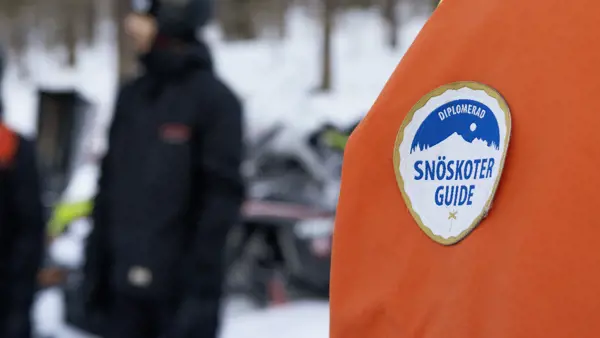 Snöskoterguide under utbildning